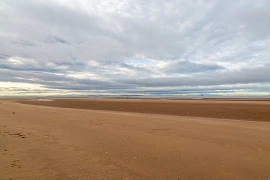 The Vast Sandy Beach At Formby In Merseyside, At Low Tide