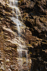 Little waterfall in mountains, Norway.