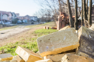 A bunch of yellow brick for the construction of a full 
