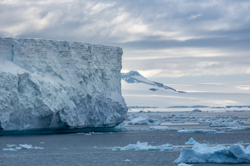 Navigating among enormous icebergs, including the world's largest recorded B-15, calved from the...
