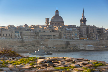 Fototapeta na wymiar Beautiful architecture of the Valletta city at sunrise, Malta