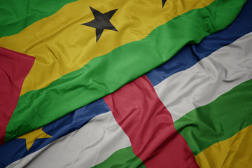 waving colorful flag of central african republic and national flag of sao tome and principe .