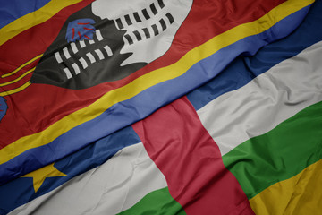 waving colorful flag of central african republic and national flag of swaziland.