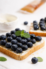 blueberry toast with cream cheese and honey