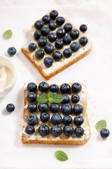blueberry toast with cream cheese and honey
