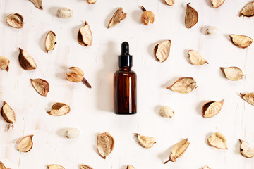 amber glass bottle with glass dropper with natural product