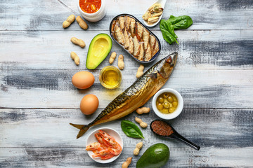 Healthy products rich in omega-3 on wooden background