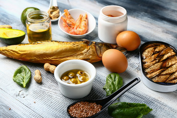 Healthy products rich in omega-3 on wooden background