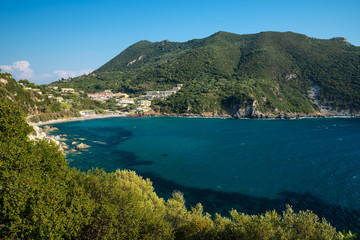 Fototapeta na wymiar The mountainous coast of the Greek island of Corfu on the Ionian sea