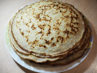 a stack of fried pancakes on a plate