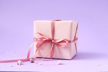Packed gift on color background