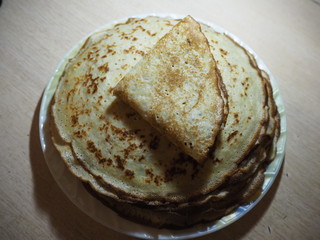 a stack of fried pancakes on a plate