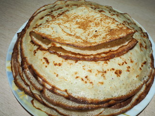 a stack of fried pancakes on a plate