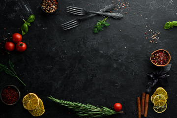 Black Stone Food Background. Cooking Ingredients. Top view. Free space for your text.