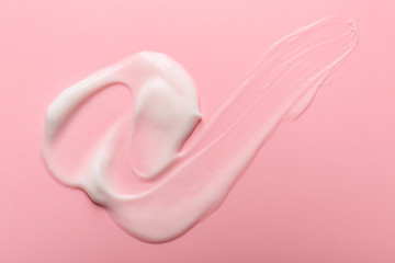 Sample of cream on color background