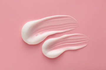 Sample of cream on color background