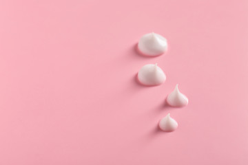 Sample of cream on color background