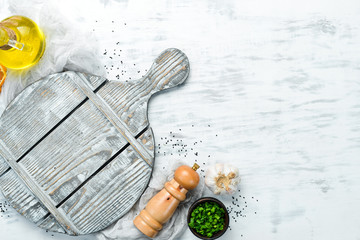 White food background. Vegetables and spices on a white background. Top view. Free space for your text.