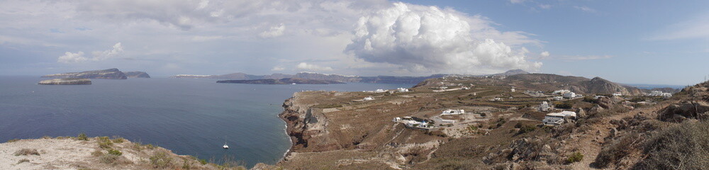 Panoramic views of the caldera, mountains, the Mediterranean Sea, and the city of Fira from the Akrotiri Lighthouse.