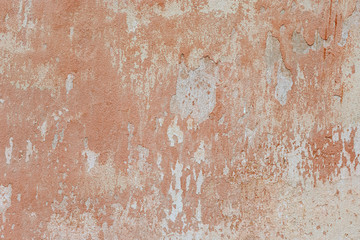 old stucco texture. Cracks and scratches on the old wall.