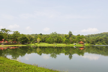 Fototapeta na wymiar Camping tent by a lake Jedkod-Pongkonsao Natural Study in Saraburi Thailand