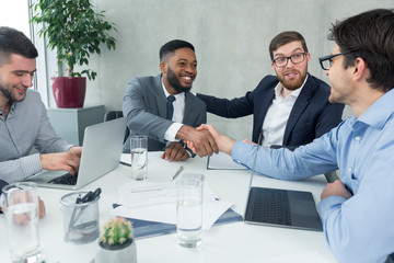 Nice to meet you! Business people shaking hands at first meeting