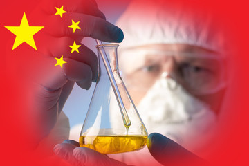 China's chemical industry. Development of new synthetic substances in China. A man in a protective...