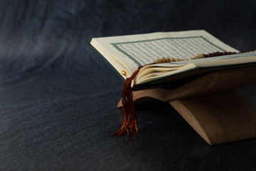 Quran - holy book of Muslims religion, Concept: open book holy prayers for god,