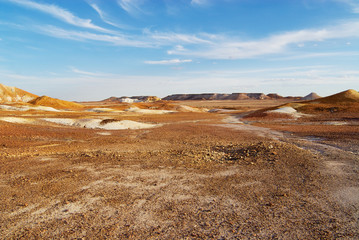 The Breakaways reserve landscape near Coober Pedy at sunset in South Australia, Australia.
