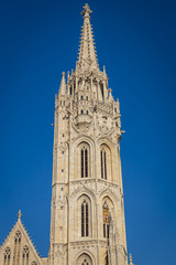 Fototapeta na wymiar Matthias Church tower and blue sky, Budapest city, Hungary