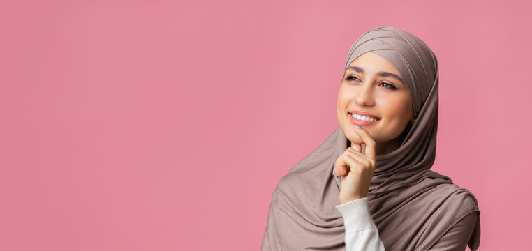 Closeup portrait of pensive arabic girl in headscarf, overthinking about something