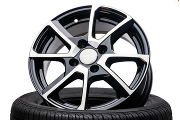 cast aluminum disc alloy wheel closeup on white background. Isolate.