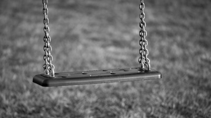 Empty swing on playground
