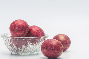 The Still life photos of passion fruit, pulp and juice on white background