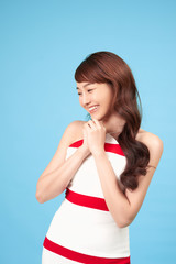 Asian woman happy with special deals & discounts of promotions on blue background