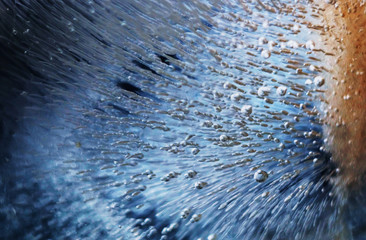 Underwater air bubbles are streaming. Radiance sparkles in the water, sea, aquarium. Sparkling...
