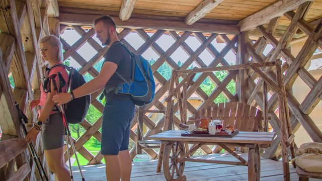 Young couple ready for hicking in Lesnik tourist farmhouse , Slovenia