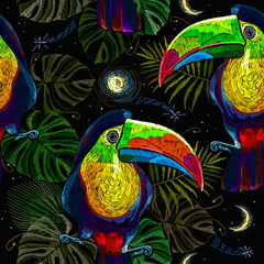 Colorful keel-billed toucan birds, moon and palm leaves seamless pattern. Embroidery art. Ramphastos sulfuratus. Jungle paradise background. Fashionable template for design of clothes, textiles © Matrioshka