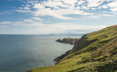 View of Dublin Bay from Howth Head peninsula near Dublin, Ireland. The Bailey Lighthouse is in the midground and Bray Head in the background.