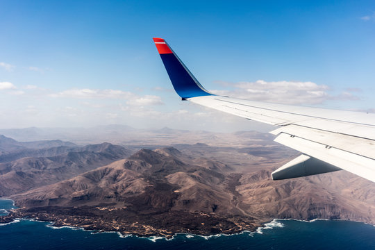 Canary Islands mountain landscape under airplane wing