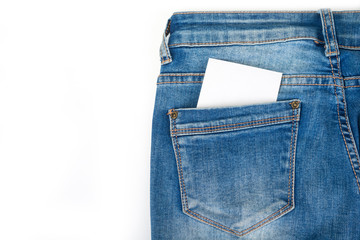 Blue jeans back pocket with paper note
