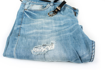 Modern fashionable blue jeans cloth with holes