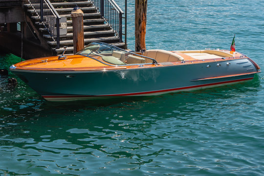 View Of An Elegant Old Fashioned Wooden Motor Boat. A Classic Mahogany Motorboat Typical Of Lake Como.