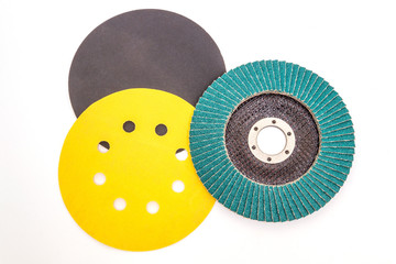 Set of abrasive tools different colors on white background