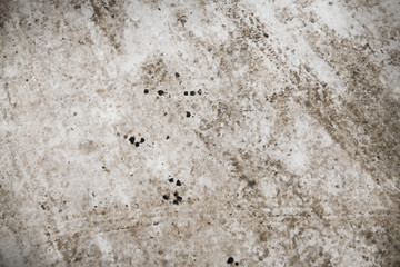 Texture of snow on the road tracks and dirt