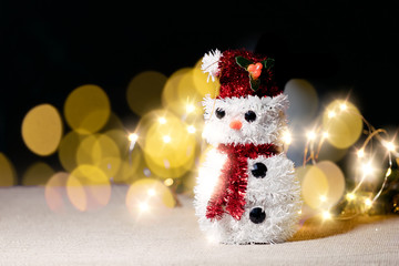 Christmas background with a snowman toy