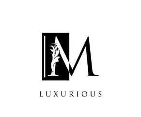 Elegant M Letter Swirl Logo. Black and White M With Classy Leaves Shape design perfect for fashion, Jewelry, Beauty Salon, Cosmetics, Spa, Hotel and Restaurant Logo. 