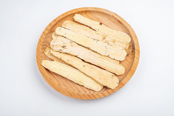 Astragalus medicinal herbs on white background