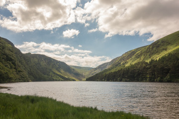 Upper Lake at Glendalough, County Wicklow, Ireland. The Glendalough valley is located in Wicklow Mountains National Park and is home to an Early Medieval monastic settlement.
