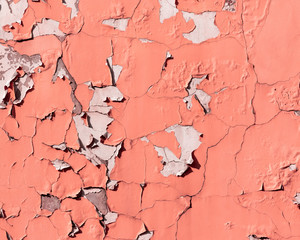 texture of cracks in peeling paint on a wall
